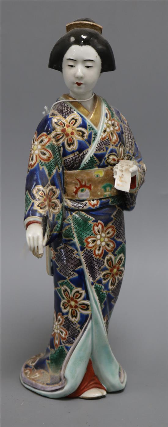 An Arita porcelain figure of a geisha height 28cm